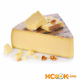 Описание качества сыра Грюйер с фото, его полезные свойства, а также применение швейцарского продукта в рецептах блюд