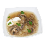 грибной суп в тарелке со сметаной